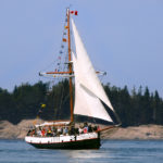 The Tall Mast and Open Sails of the Jolly Breeze Whale Watching Vessel in Saint Andrews, New Brunswick