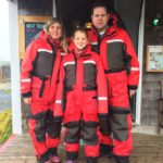 Zodiac Whale Watching Guests Claudia and Jeremy In their Heat and Flotation Suits, Saint Andrews, New Brunswick